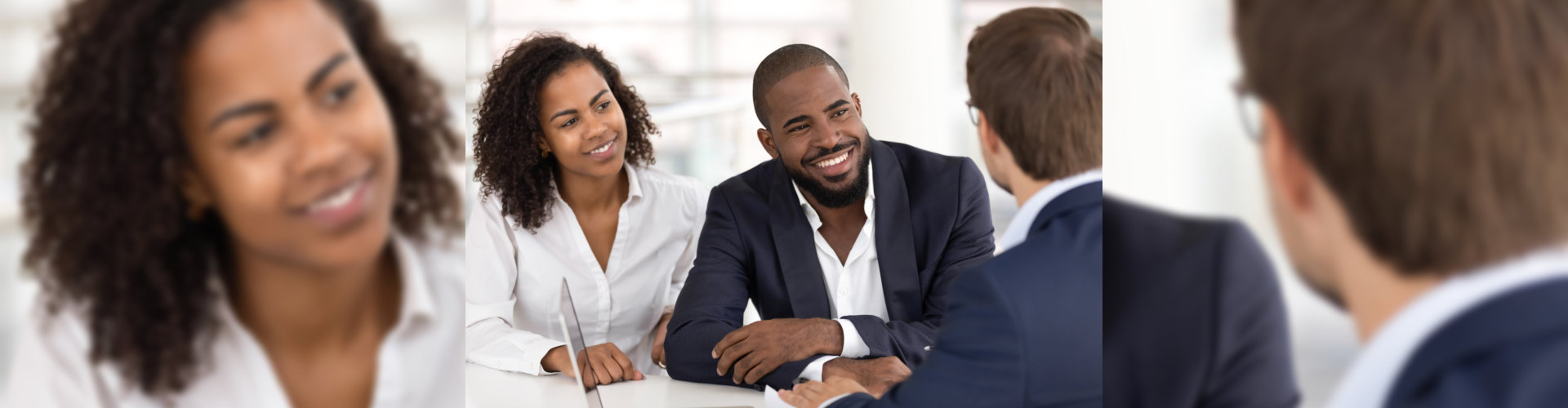 Happy african american young family couple listen to realtor insurer salesman consulting black clients at meeting, bank manager agent talking to customers explaining insurance loan mortgage deal